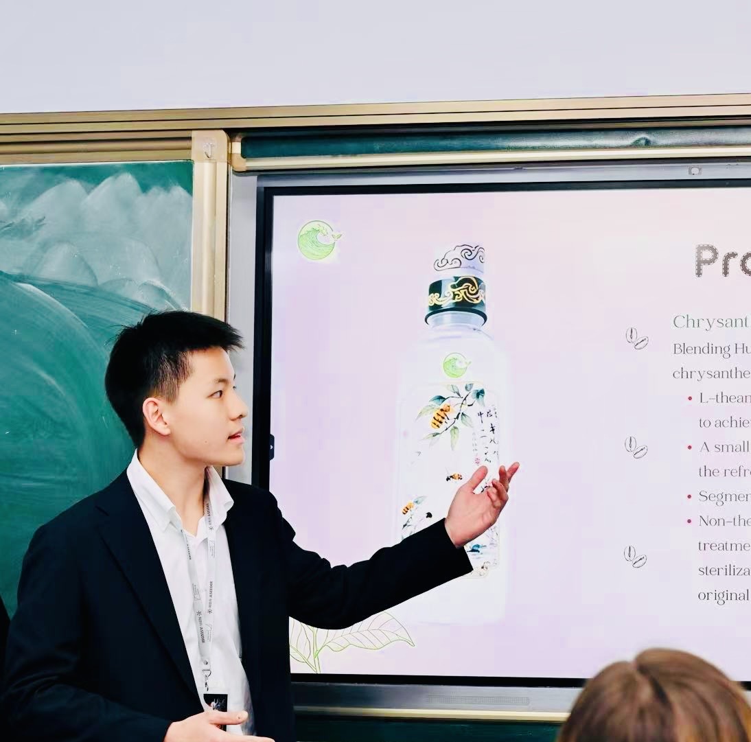 George debating at SMIC — British Parliamentary format, hands raised