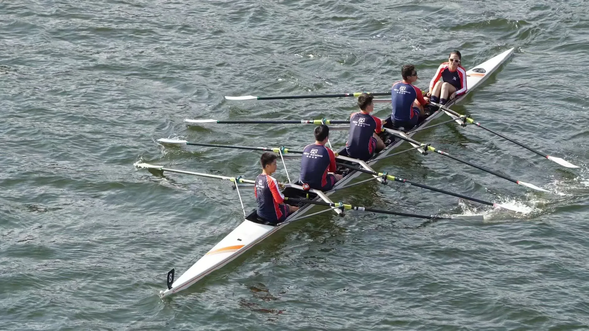 Aerial view — two racing quads on competition water