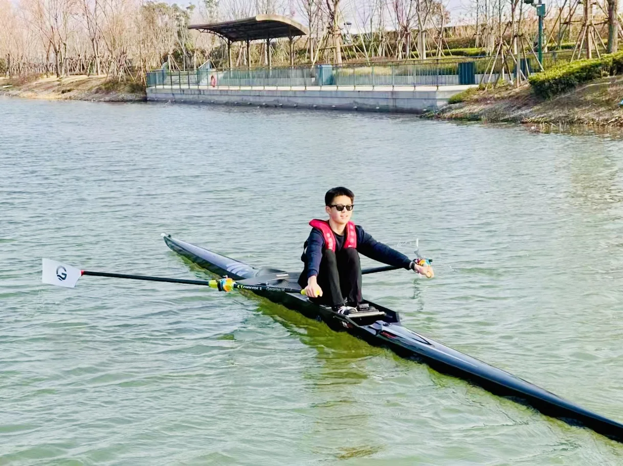 Early morning training session — sculling drills on the water